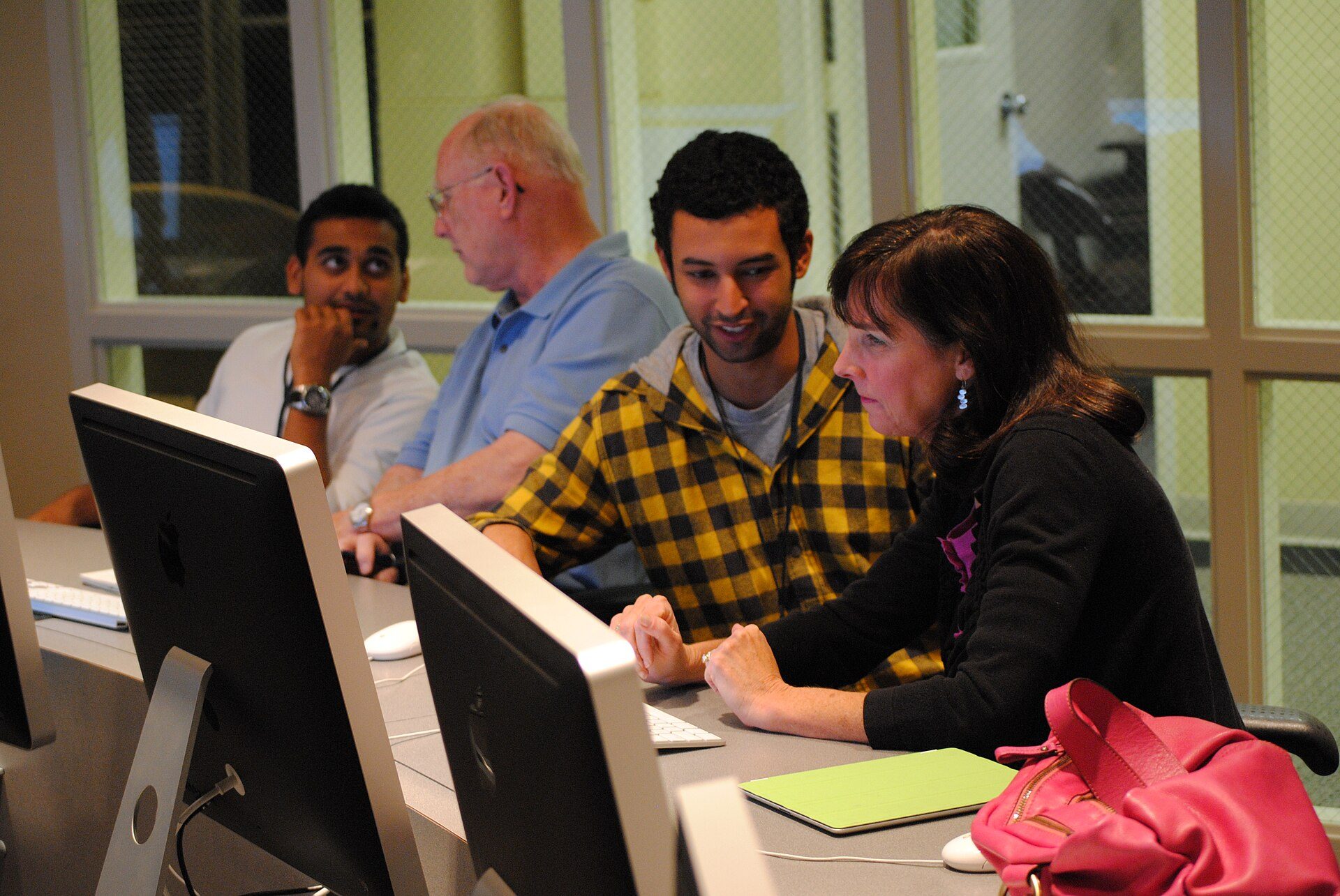 Students working at desktops in the computer lab