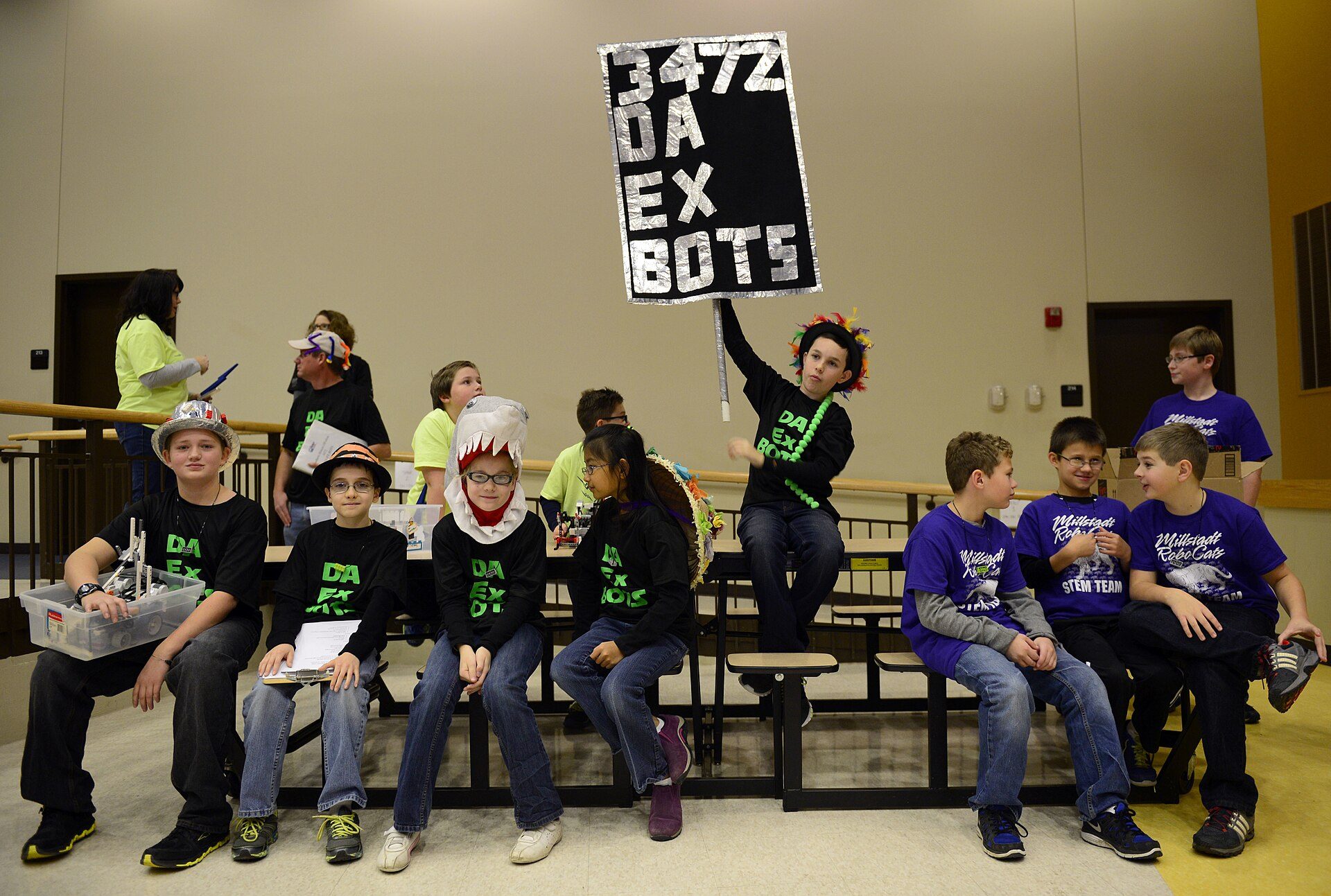 The school robotics team with their robots